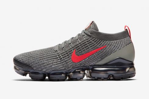 red and gray nike vapormax